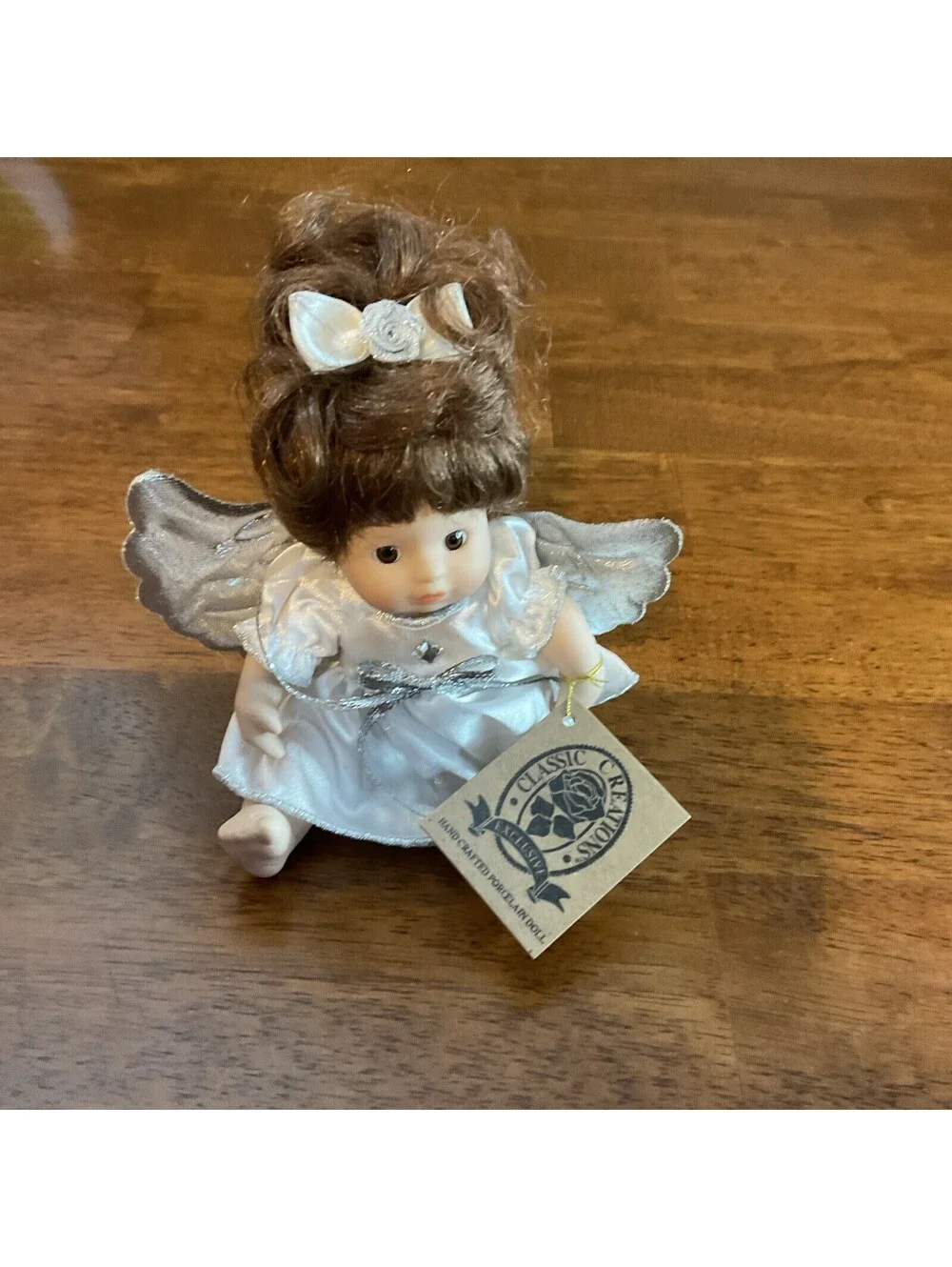 Classic Creations Porcelain Birthstone Angel doll with Gray Wings